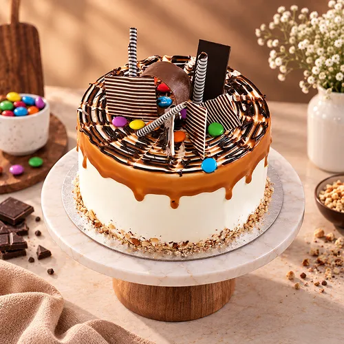 Gems Sprinkled Caramel Cake- 500 gm Gems Sprinkled Caramel Cake- 500 gm