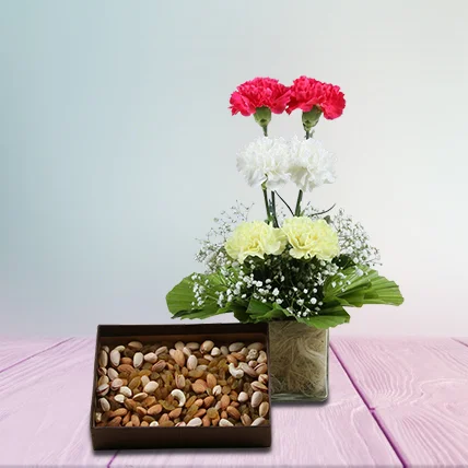 Vase Arrangement Of Carnations With Assorted Dry Fruits Vase Arrangement Of Carnations With Assorted Dry Fruits